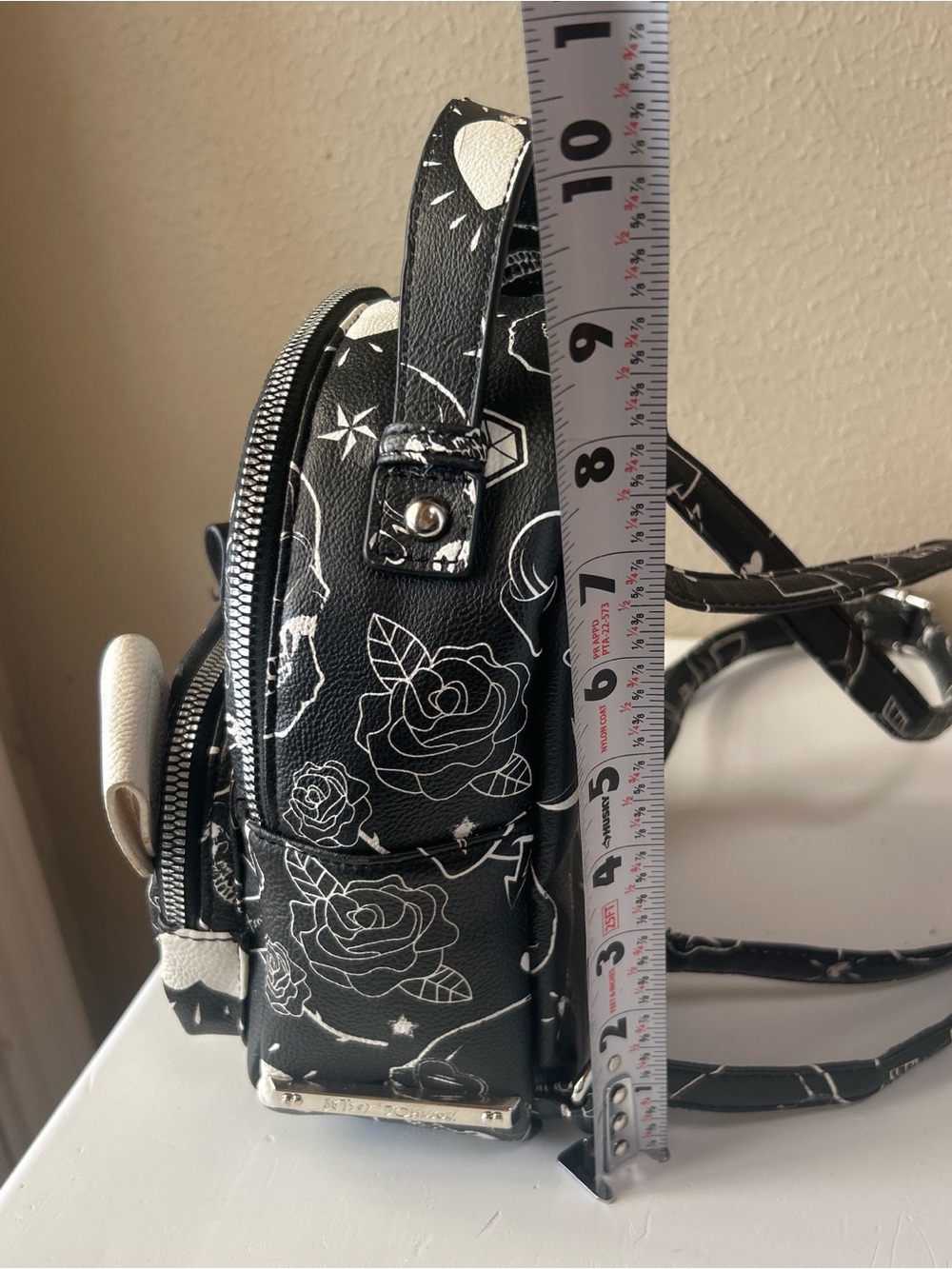 Betsey Johnson Bulldog skull tattoo print mini back pack. Damage on the handle - Picture 5 of 7